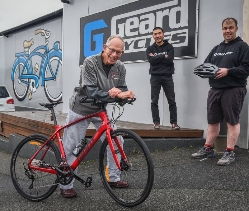 ZOOM ZOOM: David Meadows with his new bike, with Geard Cycles' owner Ian Lee and manager Doug Miller. Picture: Paul Scambler.