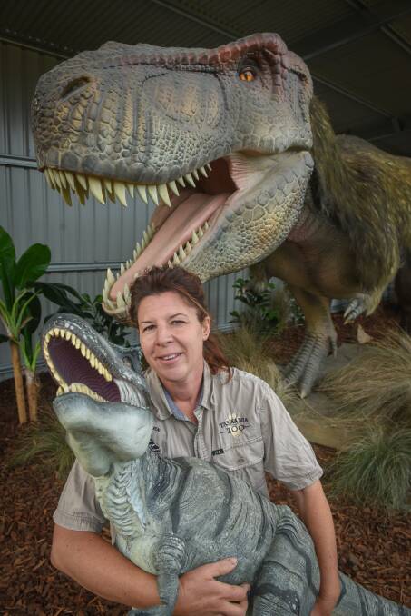 UNVEILED: Tasmania Zoo owner Rochelle Penney with the zoo's latest new creature, a Tyrannosaurus Rex. Picture: Paul Scambler.