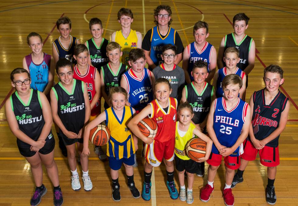 NBL PUSH: Junior basketballers at Elphin Sports Centre supporting the push for a Tasmanian NBL team.
