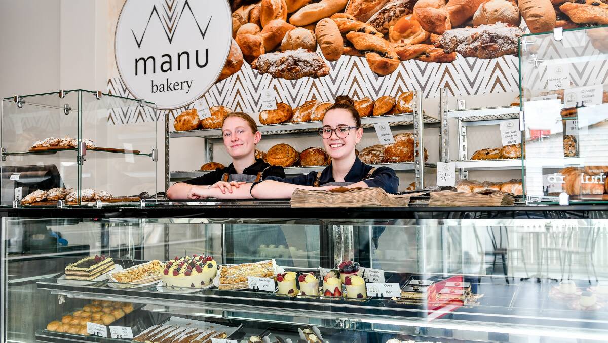 REOPENING: Manubread team member Lynsey Shepherd-Blazley and manager Bethany Marshall at the new shop front. Picture: Scott Gelston.
