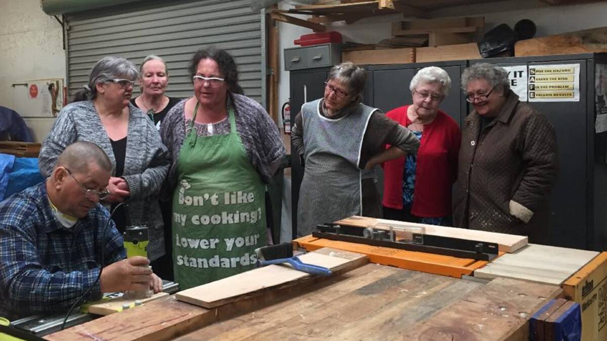 WOODWORK: Members of the Ross She Shed during a woodwork workshop in 2018. Picture supplied.