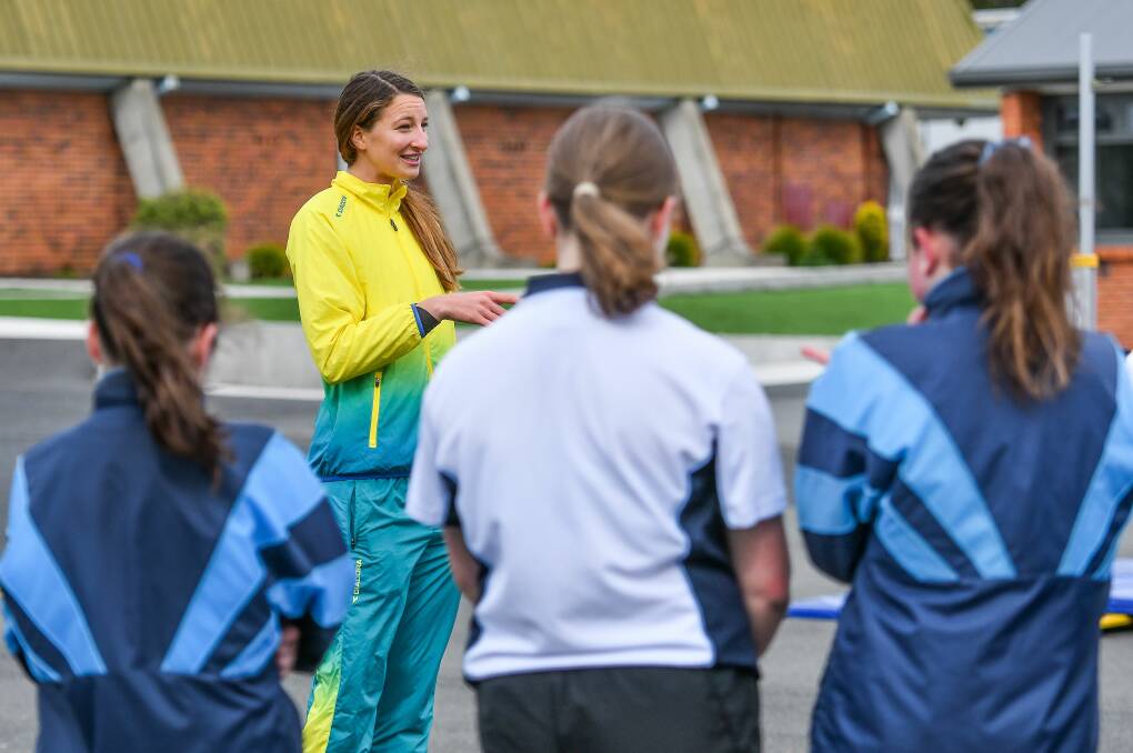 ATHLETE: Commonwealth Games bronze medallist Nicola McDermott during a coaching session at King Meadows High School. Picture: Scott Gelston.