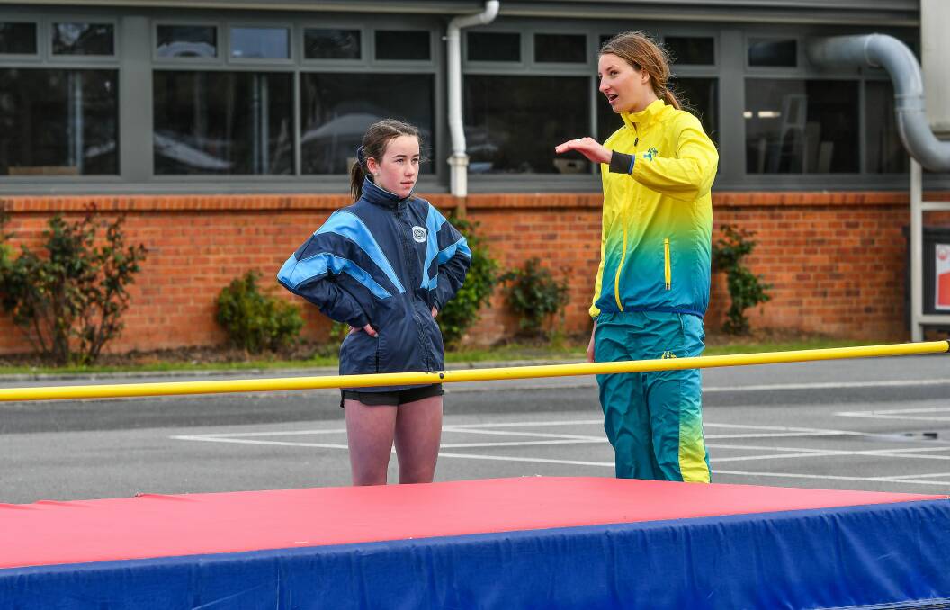 TEACH: Commonwealth Games bronze medallist Nicola McDermott talks with Kings Meadows High year 7 student Bonnie Talbot during a coaching session at the school. Picture: Scott Gelston.