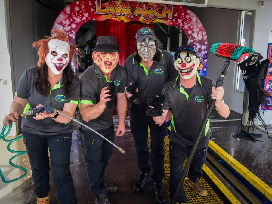 SCARE TIME: Prospect's X-Press Tunnel Car Wash owners Lisa and Jason Colgrave with staff members Steve Miller and Bobby Flanagan. Picture: Paul Scambler.