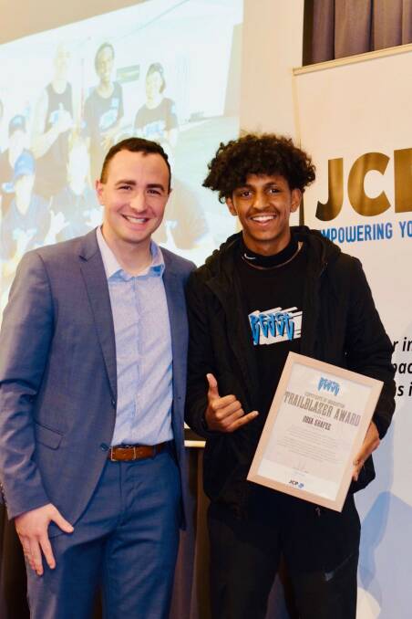 PERSONAL DEVELOPMENT: JPC Empowering Youth director Will Smith with graduate Obsa Shafee. The 14-year-old took home the Trailblaizer Award for his achievements since joining the program. Picture: supplied.