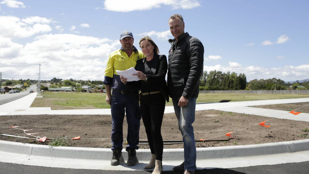 HOUSING BOOM: Building contractor Gavin Tapp with developer Keryn Nylander and Bruce McBride of Wilson Homes at a new Perth subdivision on the corner of Elizabeth and Clarence Streets. Picture: Matt Dennien.