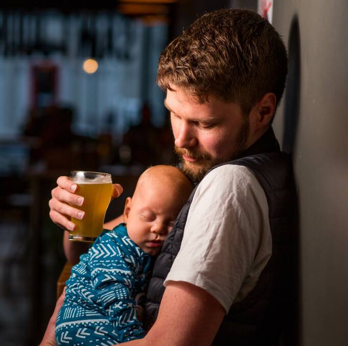 A FATHER'S LOVE: Ryan Goodger and baby Reuben, 12 weeks. Picture: Scott Gelston.