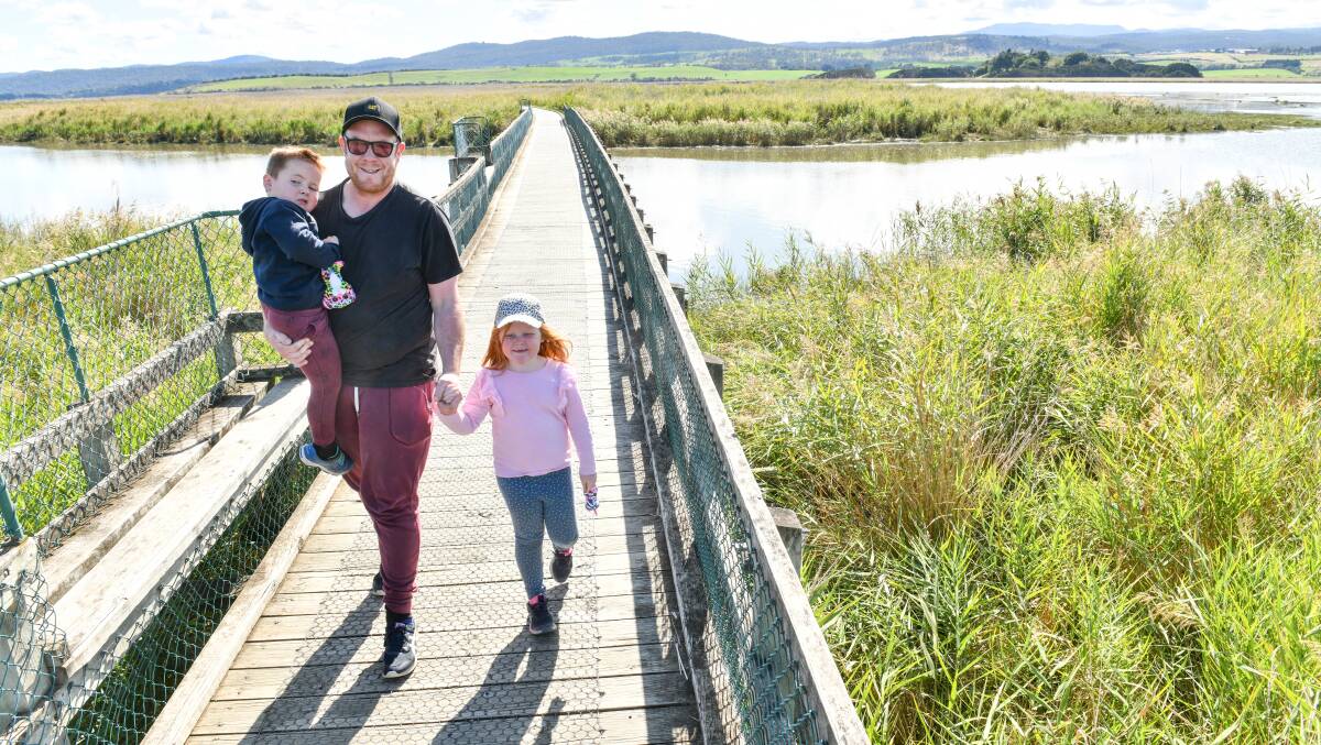 Morning stroll: Launceston's Greg Jordan took his children Jack, 4, and Annie, 6, out to Tamar Island to break up their weekend. Picture: Scott Gelston.