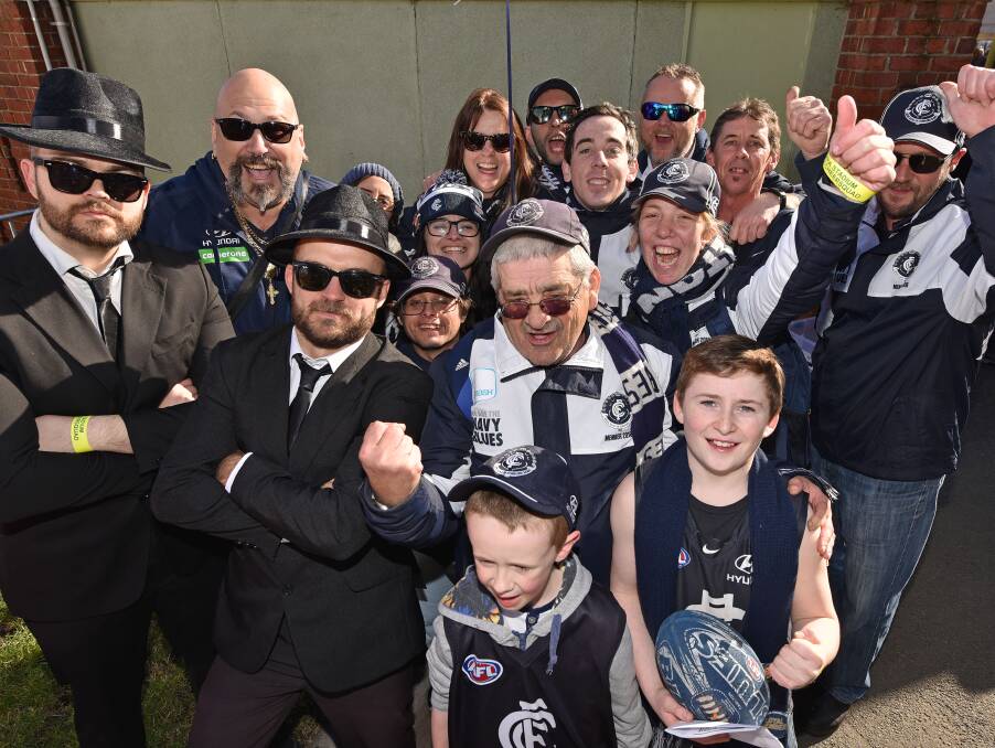 The Blues Brothers and members of Carlton's cheer squad.