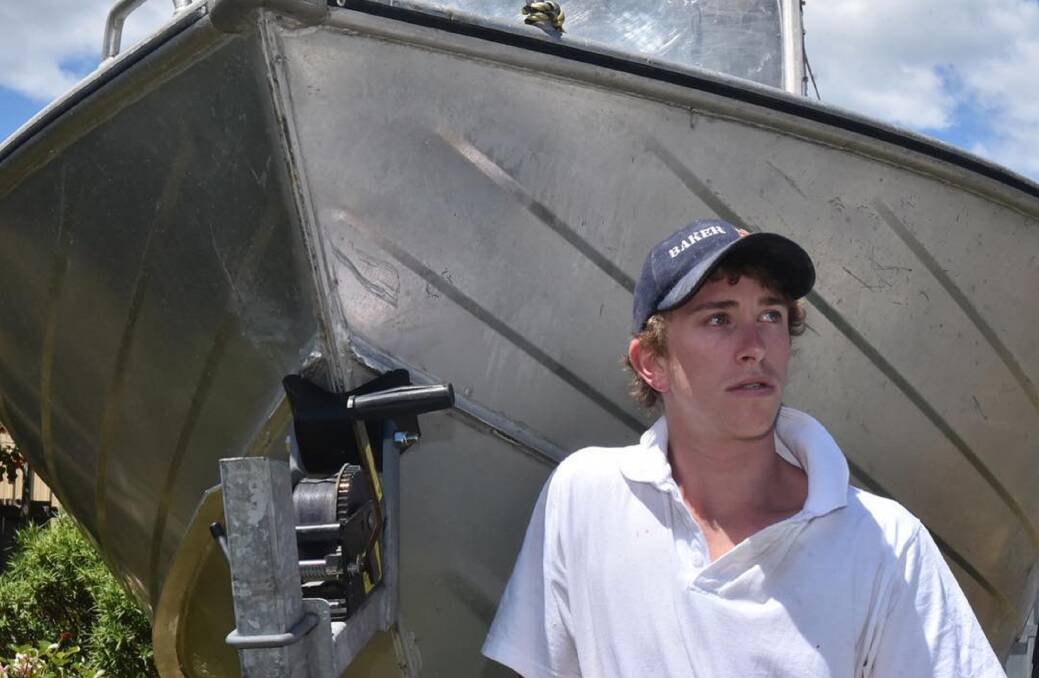 Launceston Baker Alex Duncan with his fishing boat he can't use because his ute was stolen. Picture:  Neil Richardson