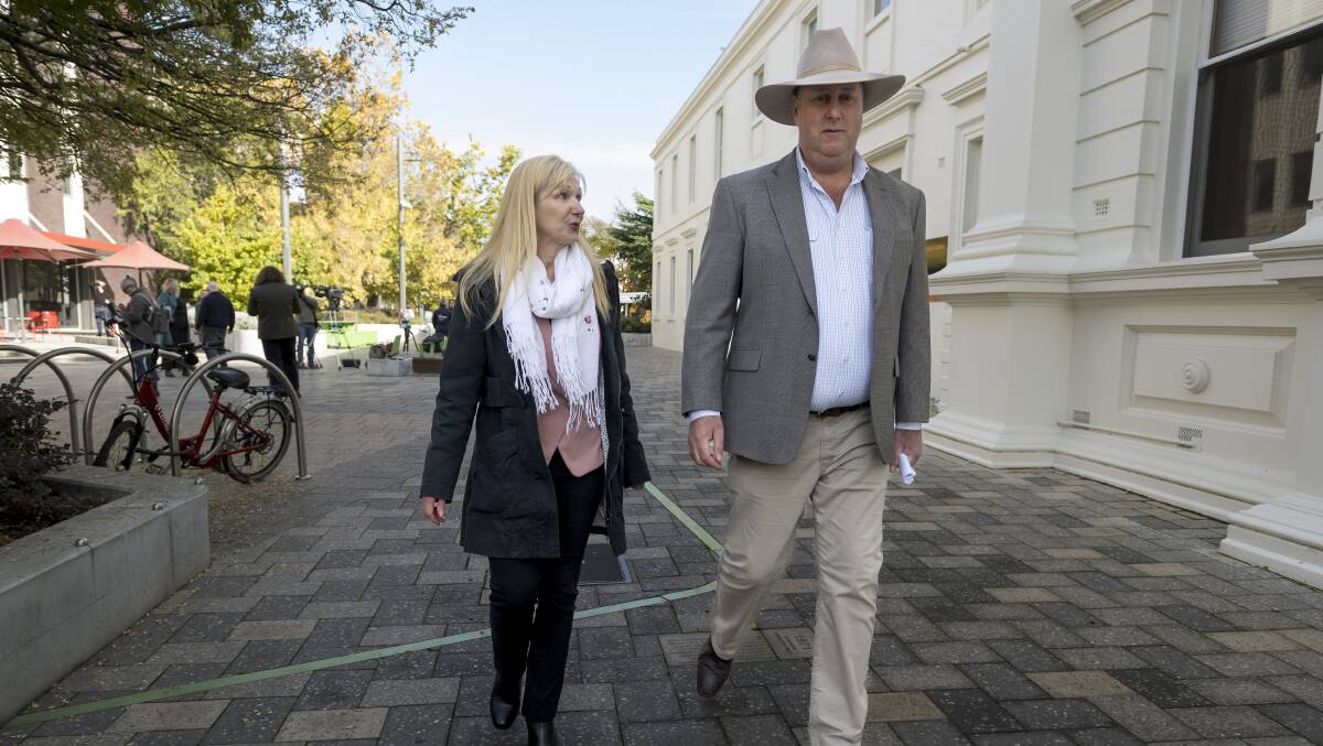 Outgoing Liberal Party members Lara Alexander and John Tucker arrive at Launceston's Civis Square on Friday. Picture by Phil Biggs.