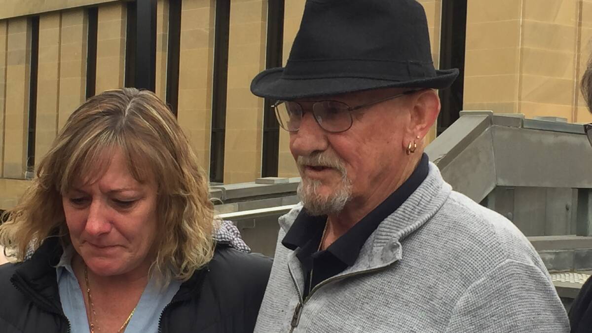 Glen Davies speaks to media outside Hobart Supreme Court alongside his daughter Kelly Goss.