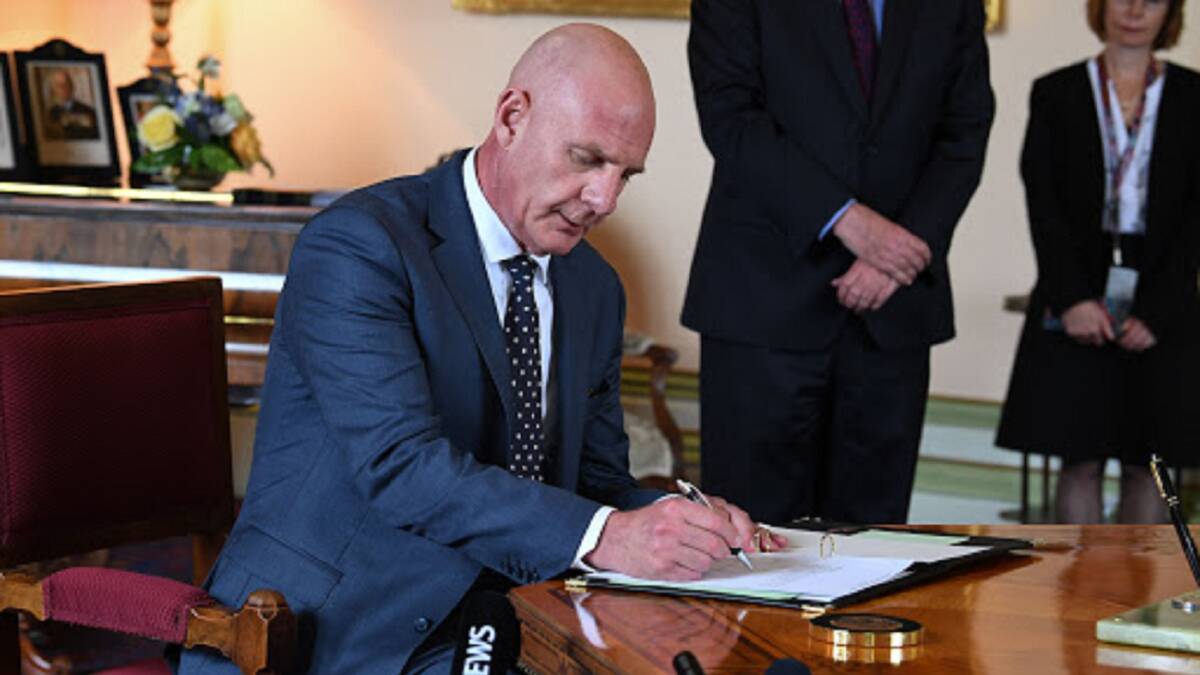 SIGNED ON: Premier Peter Gutwein was sworn in as the state's 46th leader at Government House on Monday. Picture: Neil Richardson.