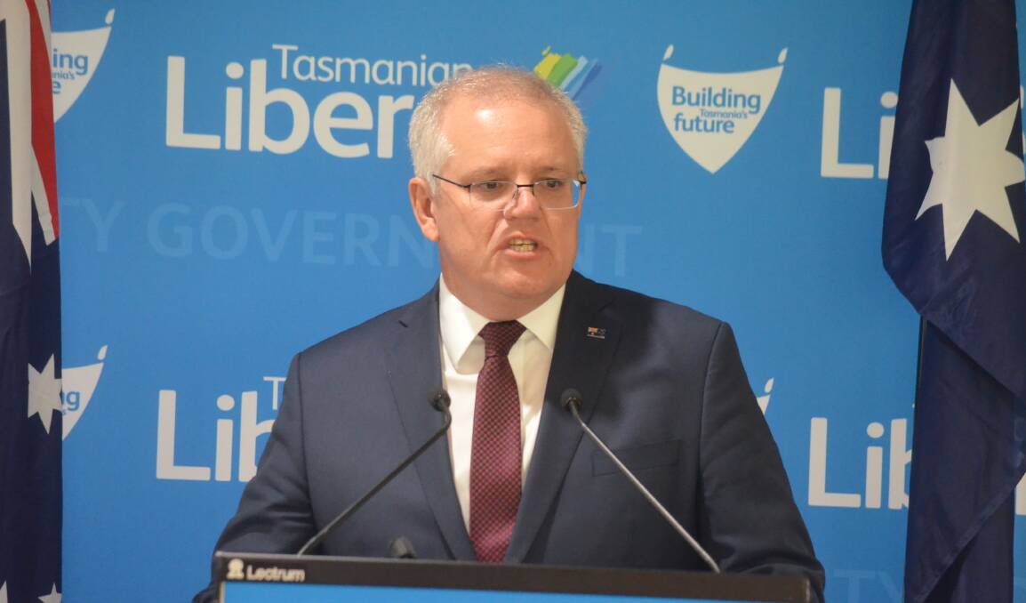 QUICK VISIT: Prime Minister Scott Morrison address delegates at the Tasmanian Liberal Party's state conference in Hobart on Saturday. Picture: Matt Maloney