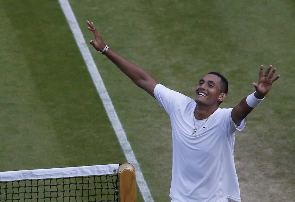 A lifetime ago: A young Kyrgios celebrates victory over Rafael Nadal at Wimbledon in 2014. Picture: Sang Tan/ AP Photo