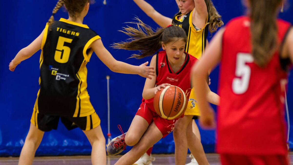 Charging through: Sophie Dean attacks at the state basketball championships last year. Picture: Phillip Biggs