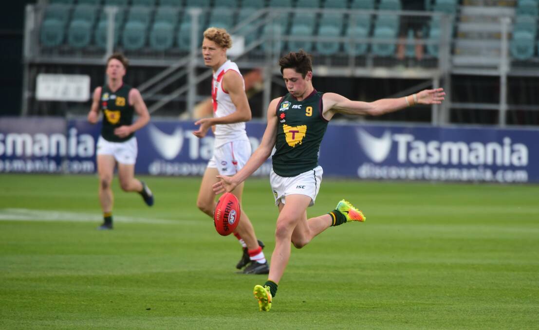 On the run: Leading Tasmania to a division two premiership was an integral part of Chayce Jones' development. Picture: Paul Scambler