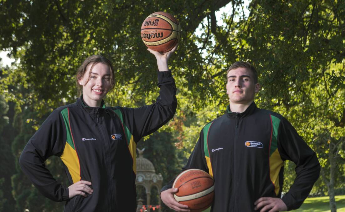 Flying high: Launceston basketball talents Lauren Wise and Sejr Deans. Picture: Phillip Biggs