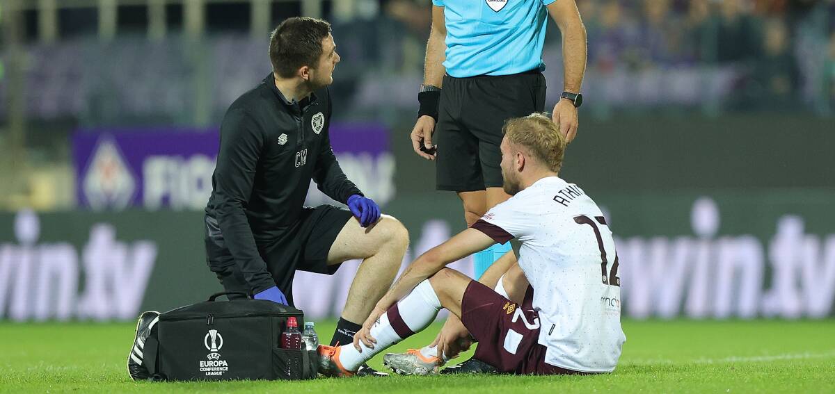 Nathaniel Atkinson receives treatment to a lower-leg injury. Picture Twitter