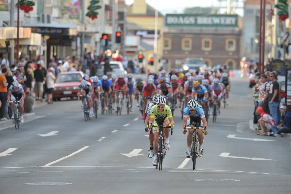 Leader: Simon Clarke (left) cycles down George Street in Launceston during the 2009 Stan Siejka Classic. Picture: Will Swan