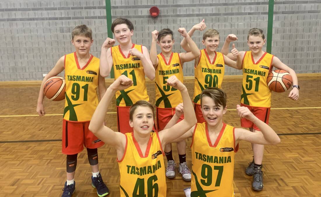 It's time: Members of the Basketball Tasmania under-14 development program celebrate the state's NBL inclusion. Picture: Josh Partridge