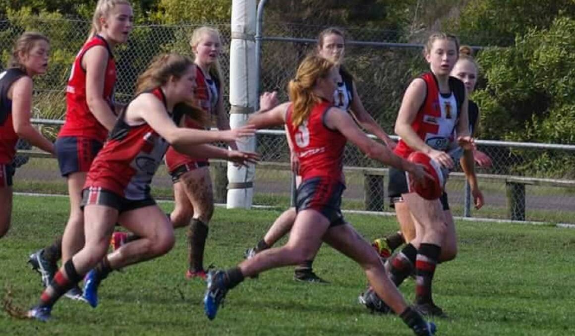 Goalward: Griffiths competing for Tamar Valley Demons.