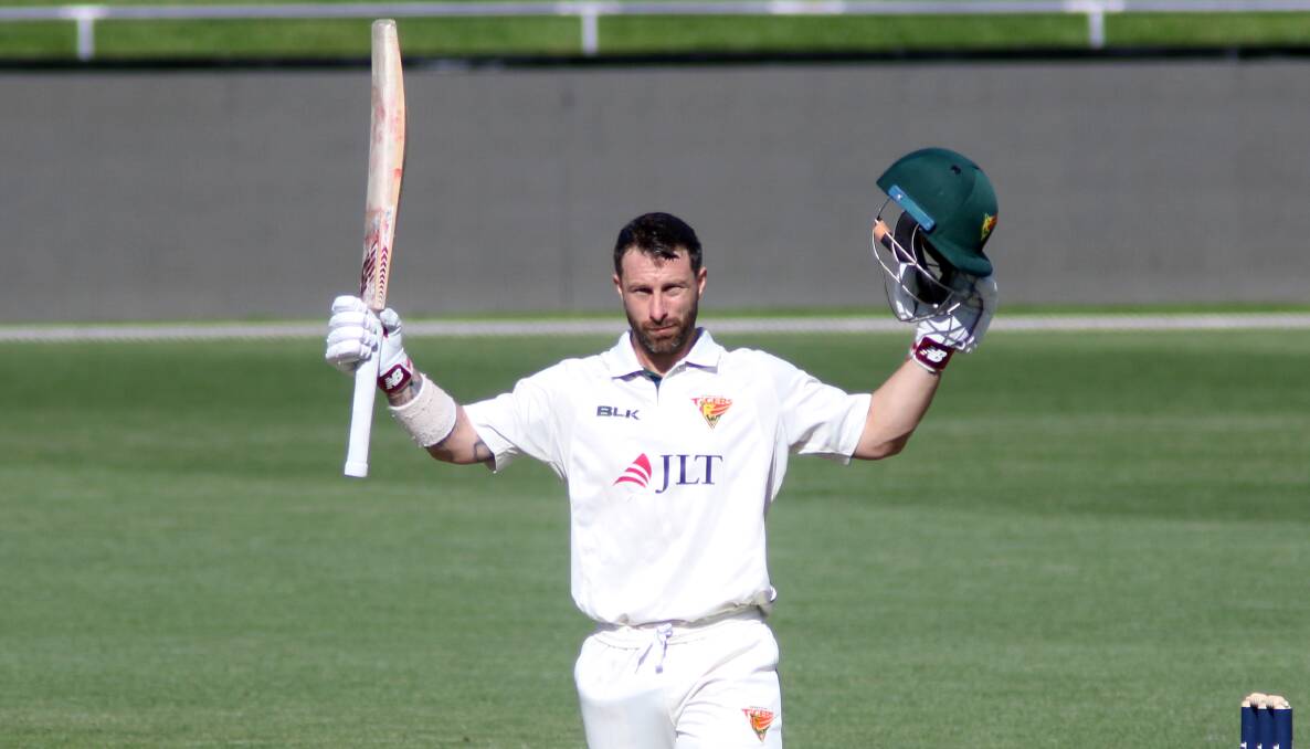 Matthew Wade raises the bat for Tasmania. Picture: Rick Smith