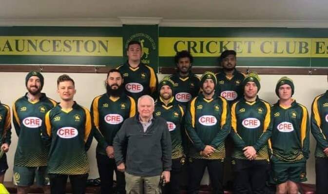 Proud: South Launceston first grade players stand alongside life member Alan Jacobson. Picture: Supplied