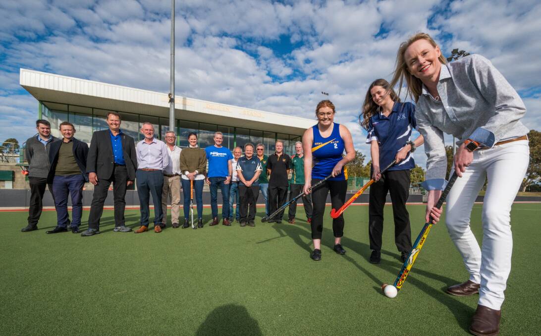 Boost: Tasmanian hockey identities stand alongside state politicians at the announcement of much-needed Northern hockey centre funding. Picture: Phillip Biggs