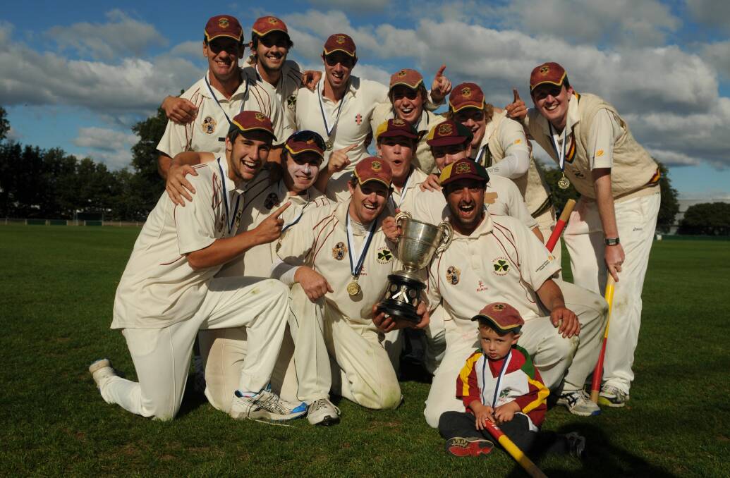 Cooper celebrates the 2011-12 premiership with Westbury. Picture by Phillip Biggs