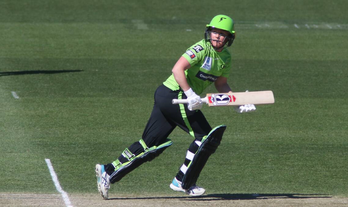 NEW COLOURS: Corinne Hall in action for the Sydney Thunder at UTAS Stadium. Picture: Rick Smith