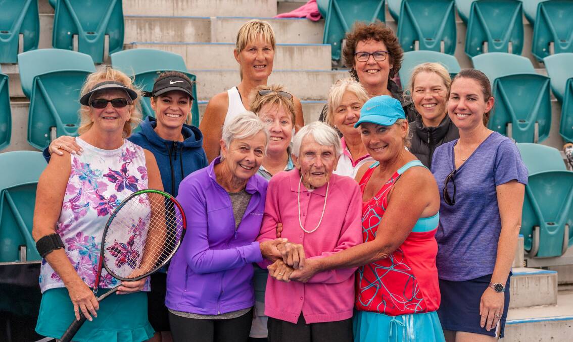 Much loved: Joan Carswell is surrounded by mid-week ladies pennant players in 2019. Picture: Phillip Biggs
