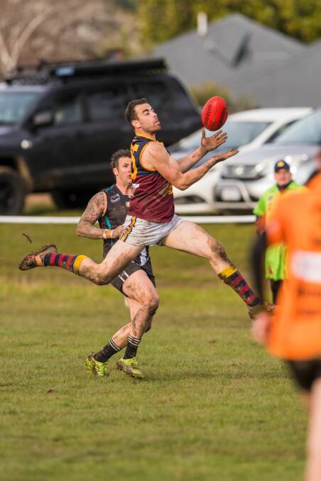 Back: Trusty defender Ryan Worn returns from the mainland. Picture: Phillip Biggs