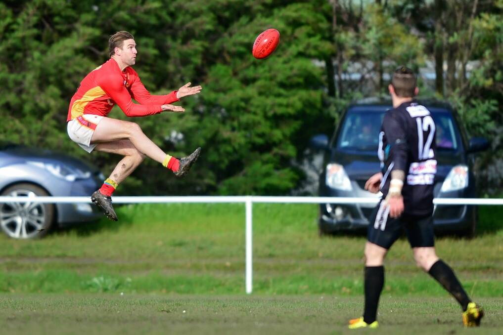 Wadley leaps to take an uncontested mark for his local side. Picture: Phillip Biggs.