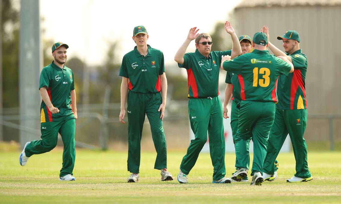 Howzat: Tasmanian Inclusion side celebrate a wicket at last week's national championships. Picture: Supplied