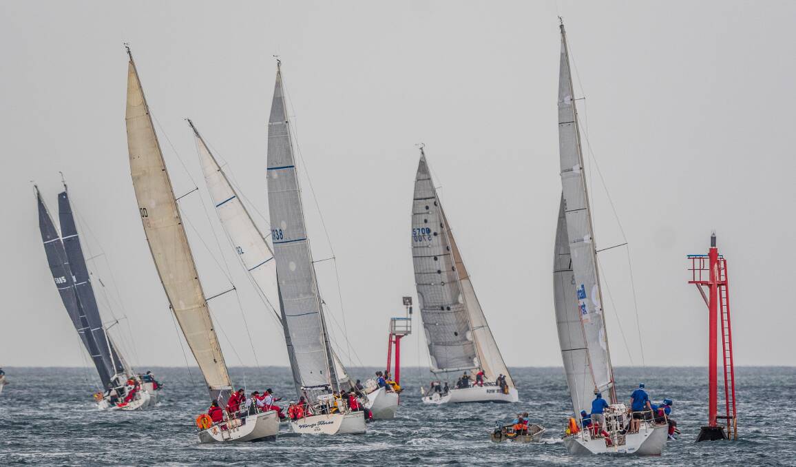 On deck: Competitors enter Bass Strait at the mouth of the Tamar RIver at Low Head at the start of the Launceston to Hobart yacht race. Picture: Phillip Biggs