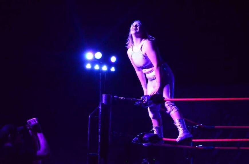 SHININING STAR: Launceston wrestler Allie Galvin makes her entrance at a Tasmanian Championship Wrestling show. Picture: Rachael Williams