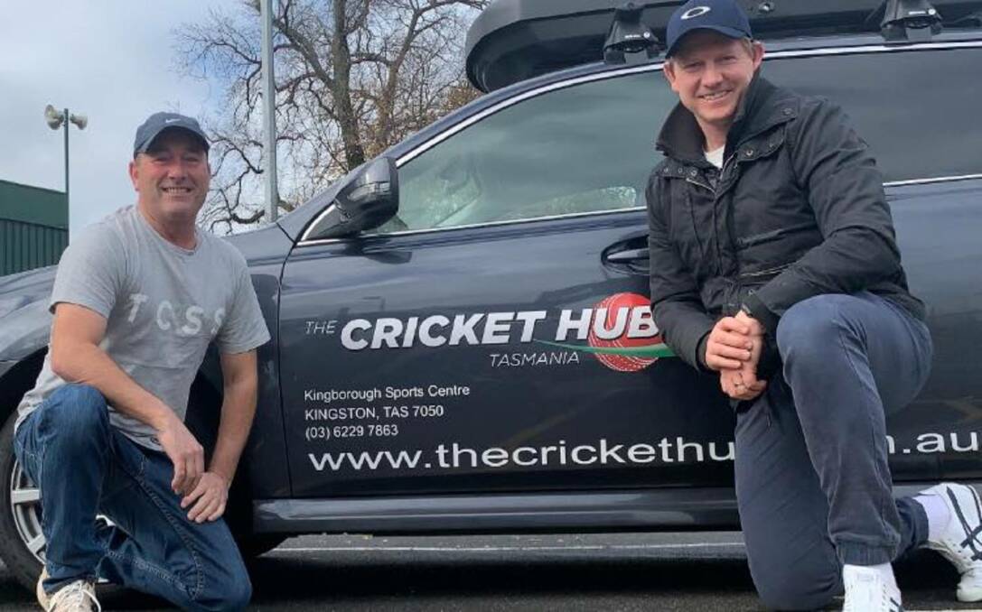 Working on it: Indoor Cricket North's Dean Hawkins with Mark Divin of Indoor Cricket World. Picture: Supplied