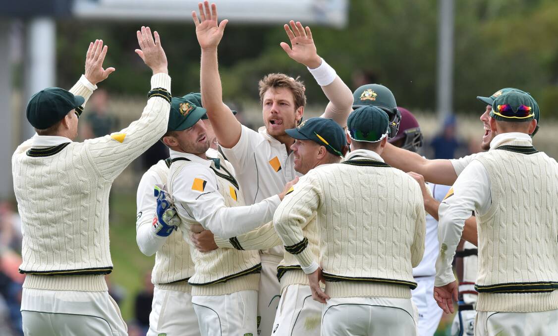 Australia celebrates a wicket against the West Indies in Hobart in 2015.