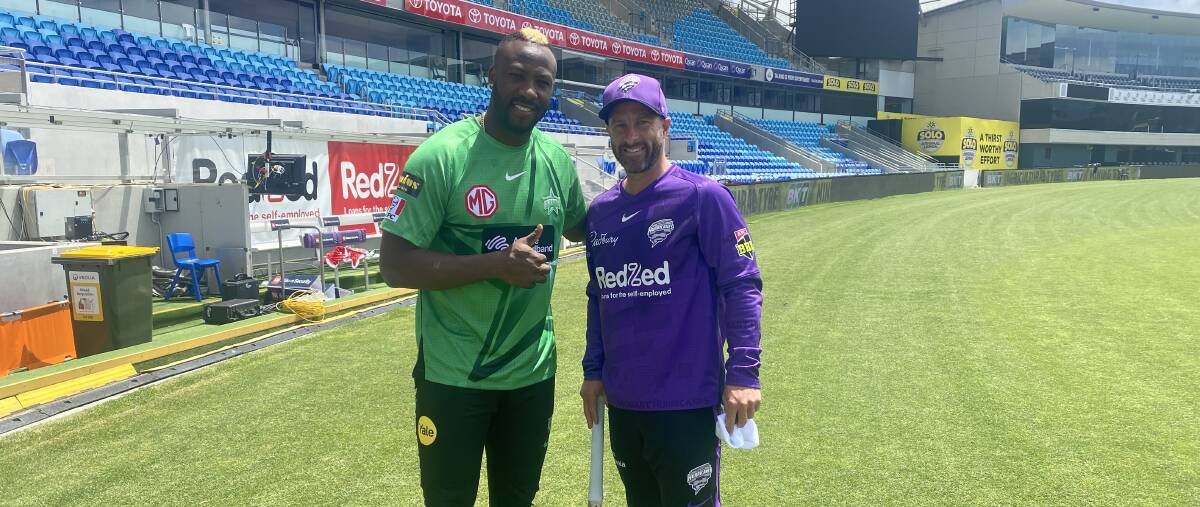 BEFORE BATTLE: Andre Russell and Matthew Wade share a moment. Picture: Hobart Hurricanes
