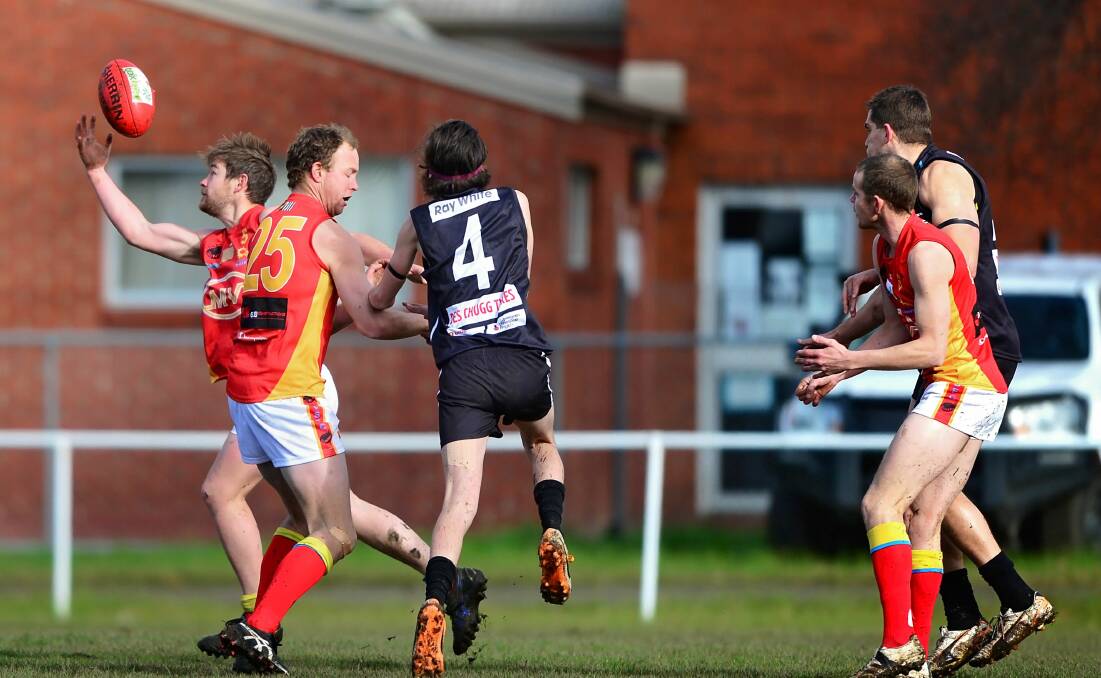 Shaw trying to compose himself and claim the ball for the Suns. Picture: Phillip Biggs.
