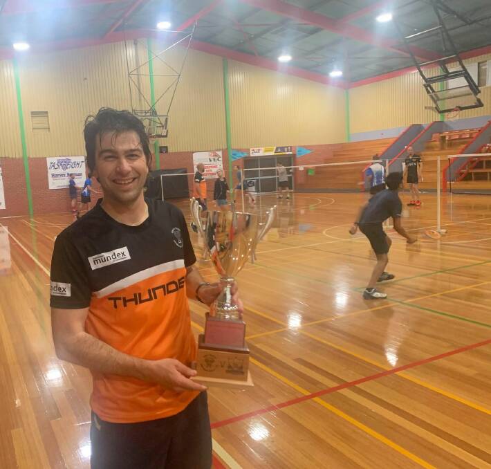 Success: North West Thunder's Brent Munday holds aloft the Hingston-Young Cup as 2019's victors. Picture: Josh Partridge