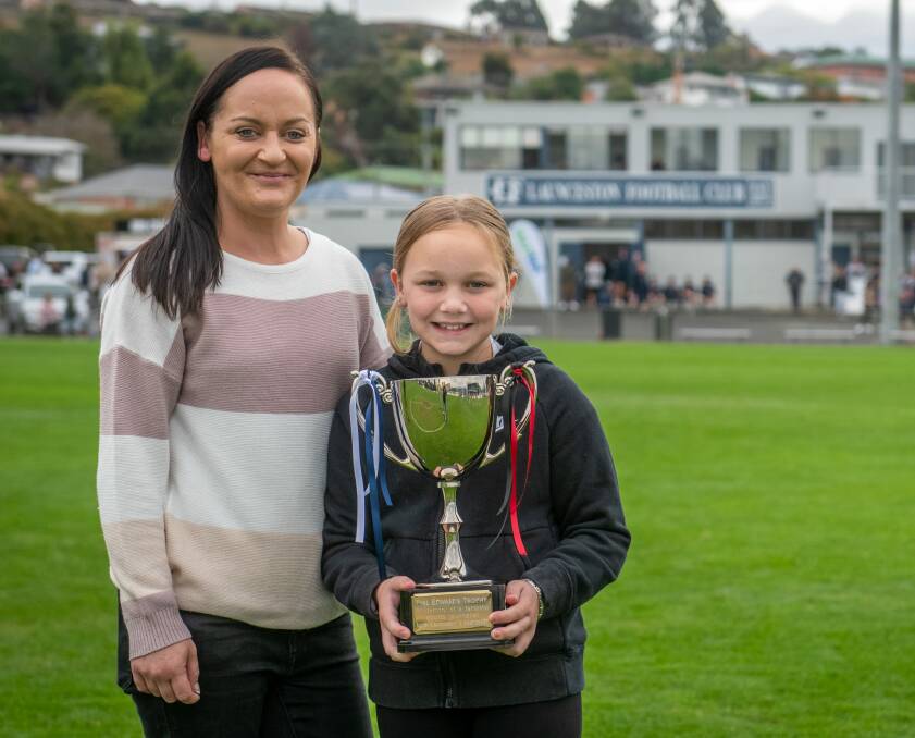 PROUD: Jess Edwards and daughter Ruby Dale, 8, with the Phil Edwards Cup. Picture: Paul Scambler 