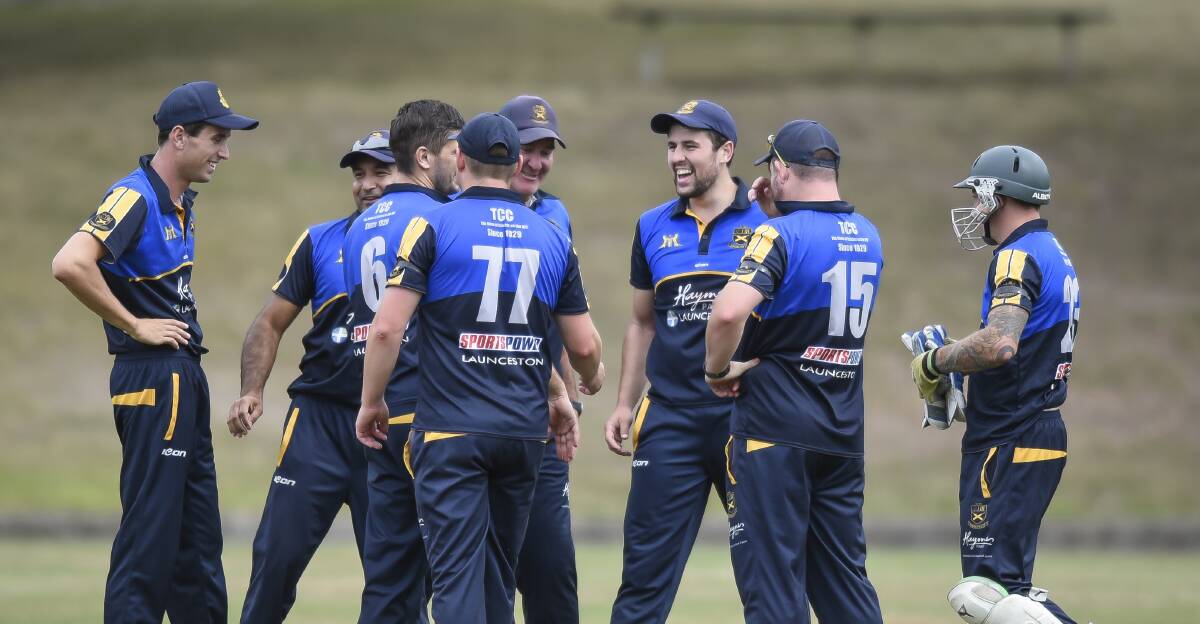 Celebration: Trevallyn's premier league side come together after a wicket. Picture: Craig George