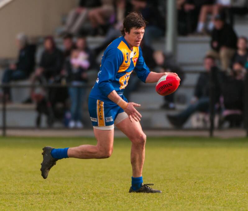 Still going: Evandale's Anthony Axton came to the club after eight consecutive George Town flags.