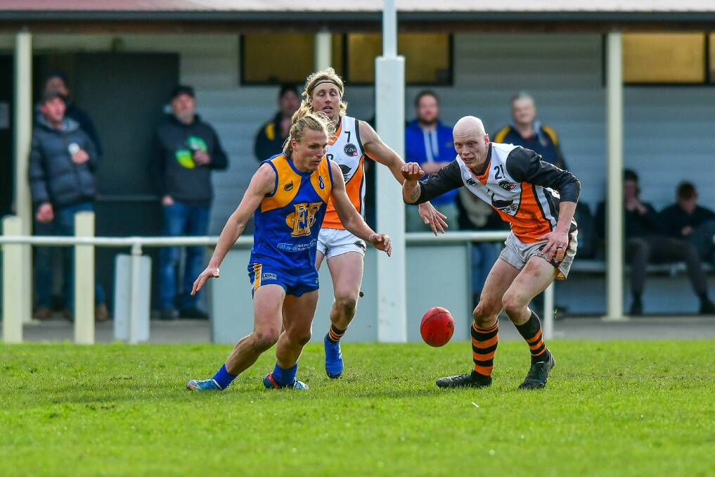It's on: Sam Bouwman and Will Stoltenberg contest for the football as Evandale picked up a 20-point win to secure their finals spot. Pictures: Scott Gelston