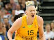 STAR: Lauren Jackson celebrates scoring at the 2012 London Olympics, where she was the Australian flag-bearer for the opening ceremony. Picture: Getty Images