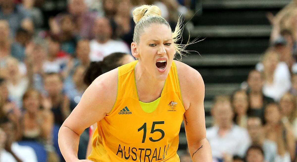 STAR: Lauren Jackson celebrates scoring at the 2012 London Olympics, where she was the Australian flag-bearer for the opening ceremony. Picture: Getty Images