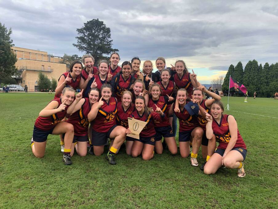 Celebration: Scotch Oakburn's girls' side followed in their boys' footsteps with a SATIS victory at Hutchins.