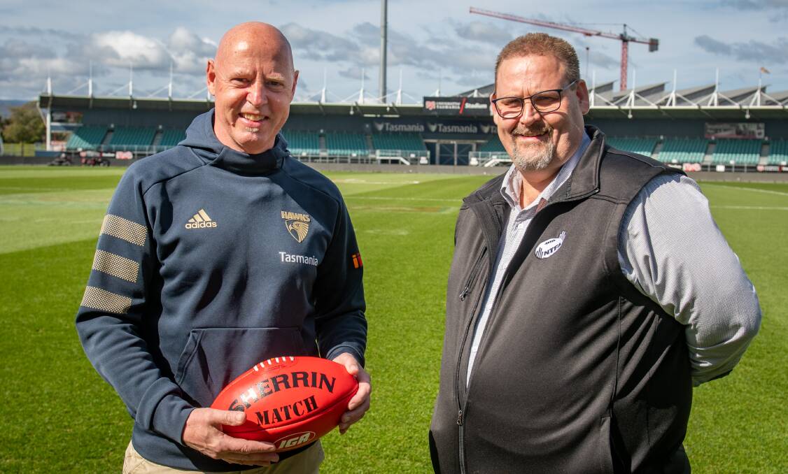 BIG GUNS: Hawthorn's Tasmania general manager David Cox and NTFA president Scott Rigby stand side by side. Picture: Paul Scambler 